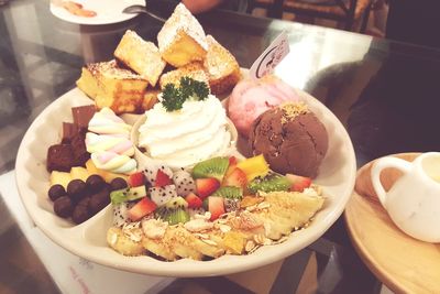 Close-up of ice cream in bowl on table