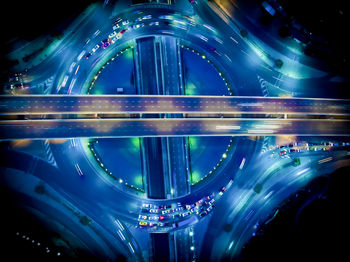 Aerial view of illuminated bridge at night