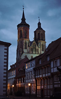 Low angle view of buildings in city against sky