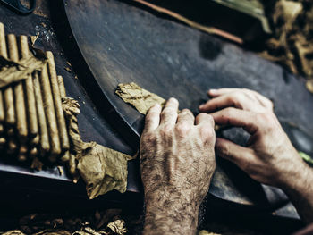 High angle view of man working on wood