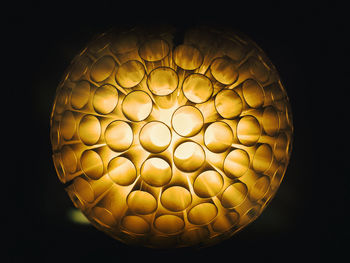 Close-up of illuminated light bulb