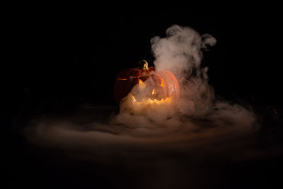 Close-up of fire against black background