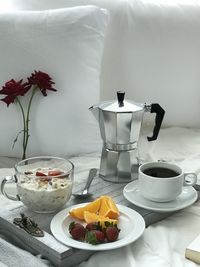 Tea cup and coffee on table