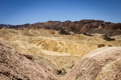 Scenic view of mountains against clear sky