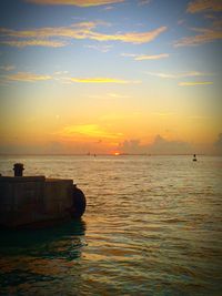 Scenic view of sea at sunset