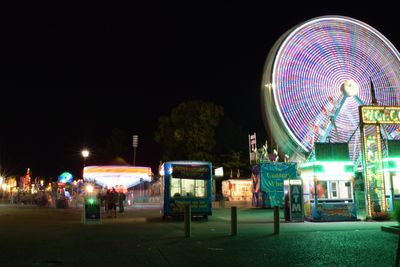 Ferris wheel against sky at night