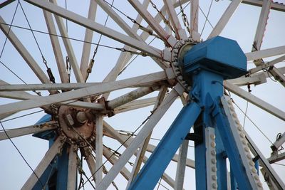 Low angle view of metallic structure against sky