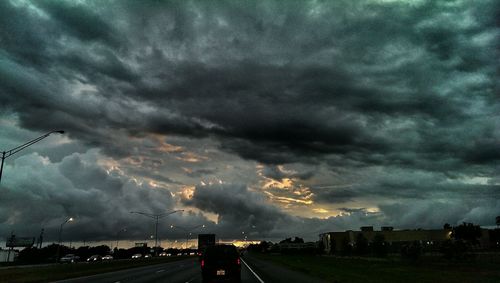 View of road against cloudy sky