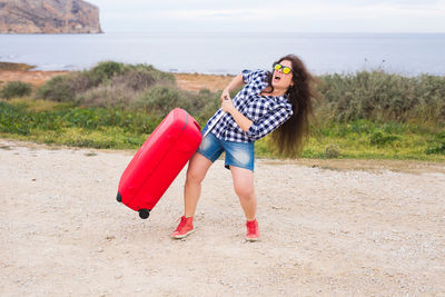 Full length of woman on beach