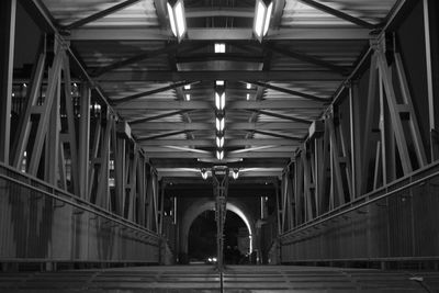 Interior of illuminated bridge at night