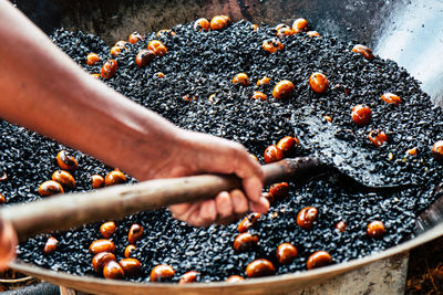 Close-up of person preparing food