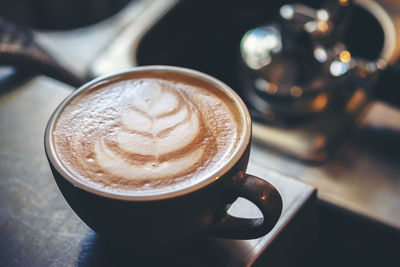 High angle view of cappuccino on table