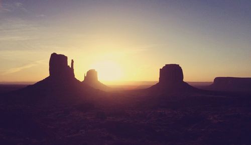 Scenic view of landscape at sunset