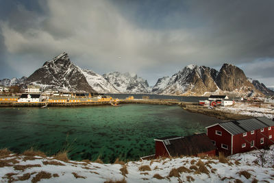 Scenic view of snowcapped mountains against sky during winter