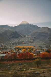 Scenic view of landscape and mountains against sky