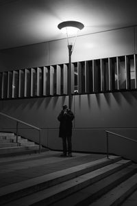 Low angle view of man standing on steps