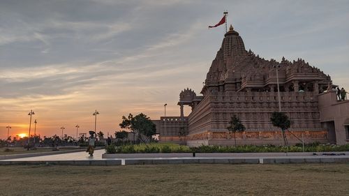 Historic building against sky during sunset