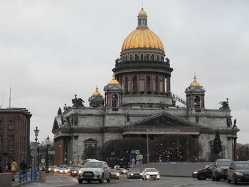 View of cathedral and buildings in city against sky