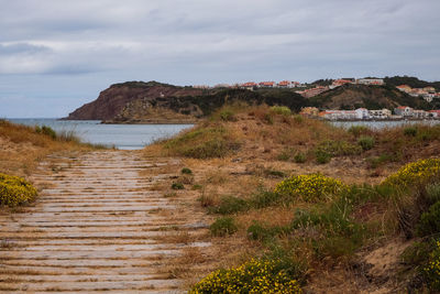 Scenic view of land against sky