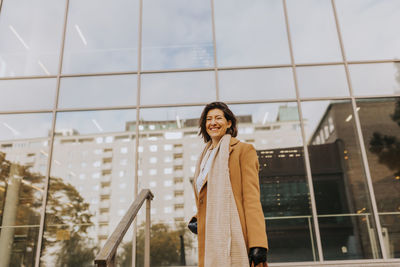 Smiling woman looking at camera