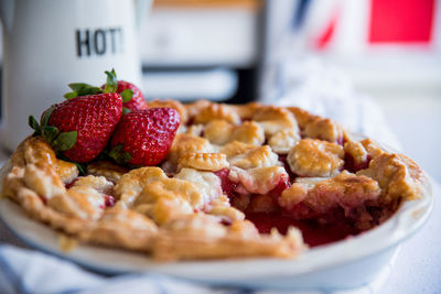 High angle view of strawberry pie on table