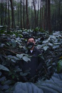 Portrait of man in forest