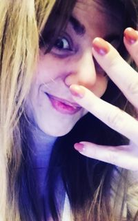 Close-up portrait of a smiling young woman