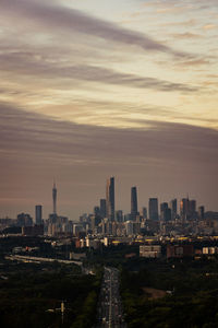 Cityscape against sky during sunset