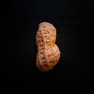 High angle view of bread on table against black background