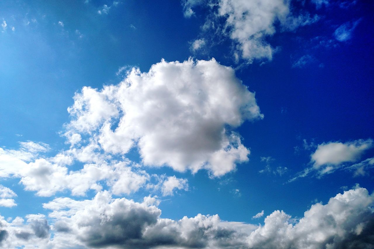 blue, low angle view, sky, sky only, beauty in nature, tranquility, cloud - sky, scenics, nature, backgrounds, tranquil scene, cloudscape, white color, full frame, cloud, idyllic, fluffy, cloudy, day, outdoors