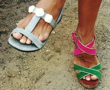 Low section of people standing on footpath