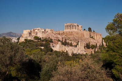 Low angle view of old ruins against clear sky
