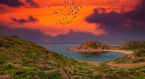 Scenic view of sea against sky during sunset