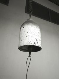 Low angle view of electric lamp hanging