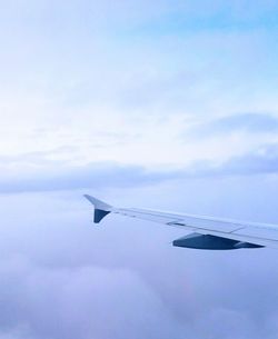 Low angle view of airplane flying in sky