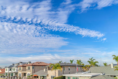 Houses against sky in town