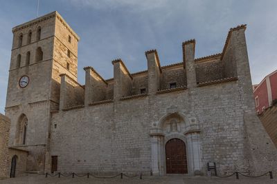 Low angle view of historic building against sky