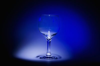Close-up of wine in water against blue background