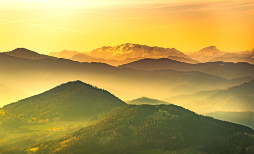 Scenic view of mountains against sky during sunset