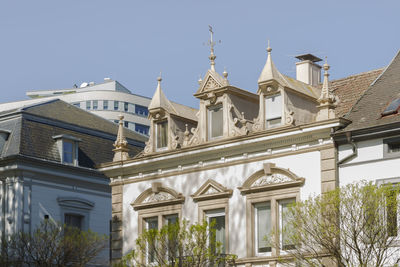 Low angle view of buildings against clear sky