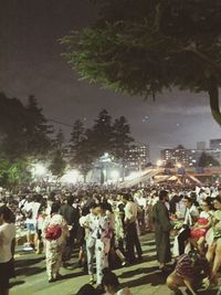 Crowd in city at night