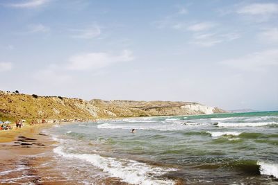 Scenic view of beach against sky