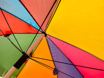 Low angle view of multi colored umbrella