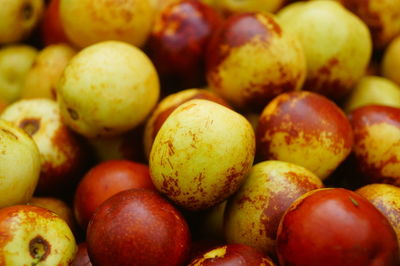 Full frame shot of apples for sale at market stall