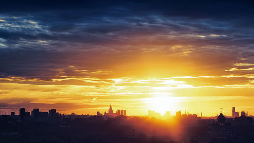 Silhouette of buildings at sunset