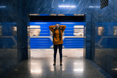 Man standing at subway station