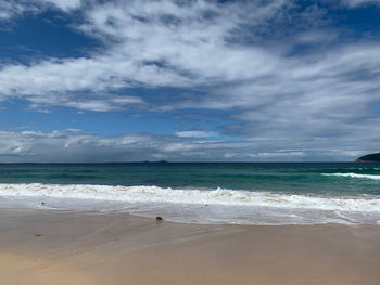 Scenic view of beach against sky