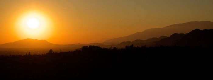 Scenic view of mountains at sunset