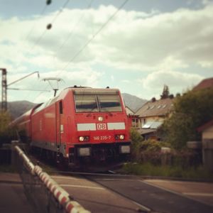 Train on road against sky