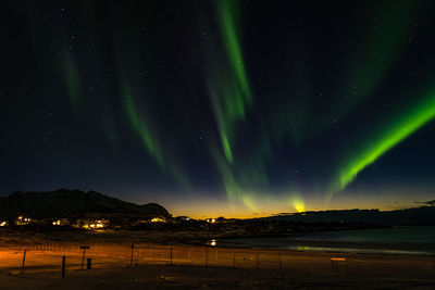 Scenic view of mountains against sky at night